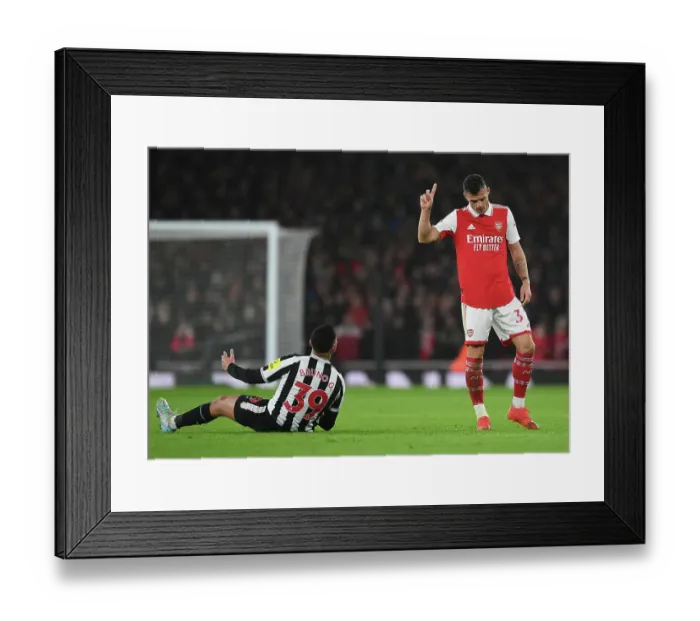Framed Print : Arsenal's Xhaka Reacts to Newcastle's Guimaraes in Intense Premier League Clash (2022-23) Framed Print : Arsenal's Xhaka Reacts to Newcastle's Guimaraes in Intense Premier League Clash (2022-23)