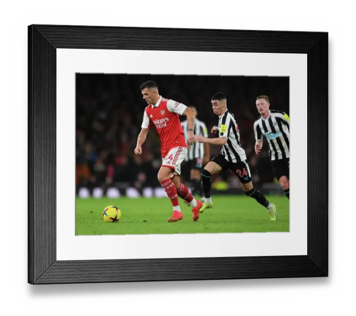 Framed Print : Xhaka vs. Almiron: A Premier League Showdown at Emirates Stadium Framed Print : Xhaka vs. Almiron: A Premier League Showdown at Emirates Stadium