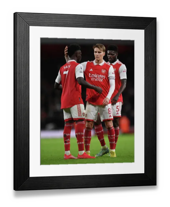Framed Print : Arsenal's Saka and Odegaard Celebrate Victory Over Newcastle United Framed Print : Arsenal's Saka and Odegaard Celebrate Victory Over Newcastle United