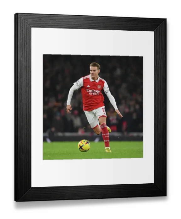 Framed Print : Martin Odegaard's Star Performance: Arsenal's Triumph Over Newcastle United in Premier League Showdown