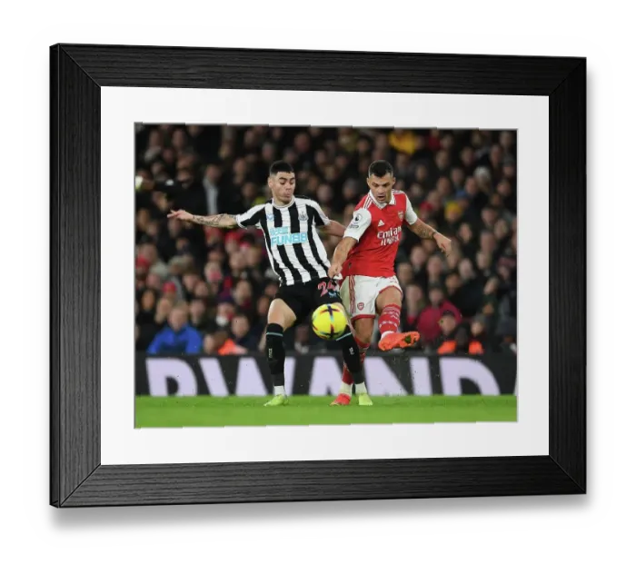 Framed Print : Xhaka's Midfield Dominance: Arsenal's Victory over Almiron's Newcastle, Premier League 2022-23 Framed Print : Xhaka's Midfield Dominance: Arsenal's Victory over Almiron's Newcastle, Premier League 2022-23