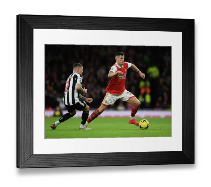 Framed Print : Granit Xhaka Breaks Past Kieran Trippier: Arsenal vs Newcastle United, Premier League 2022-23 Framed Print : Granit Xhaka Breaks Past Kieran Trippier: Arsenal vs Newcastle United, Premier League 2022-23