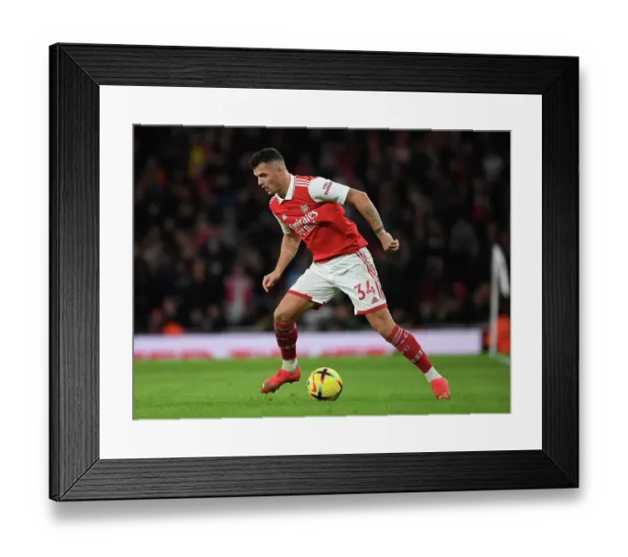 Framed Print : Granit Xhaka: In Action for Arsenal Against Newcastle United, Premier League 2022-23 Framed Print : Granit Xhaka: In Action for Arsenal Against Newcastle United, Premier League 2022-23