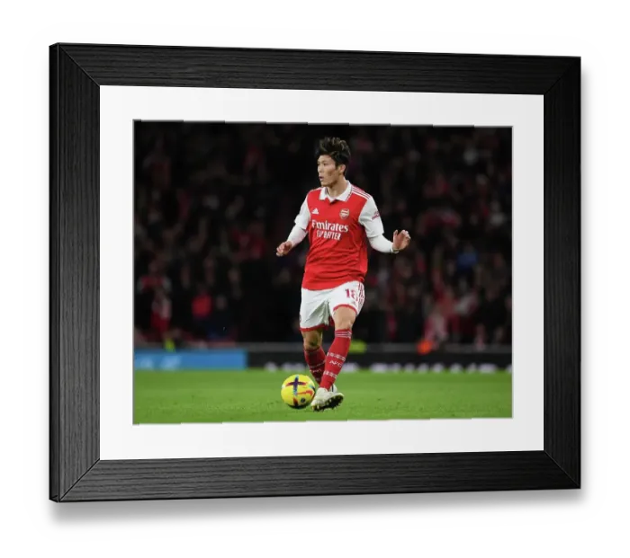Framed Print : Arsenal's Tomiyasu in Action against Newcastle in Premier League Clash (2022-23) Framed Print : Arsenal's Tomiyasu in Action against Newcastle in Premier League Clash (2022-23)