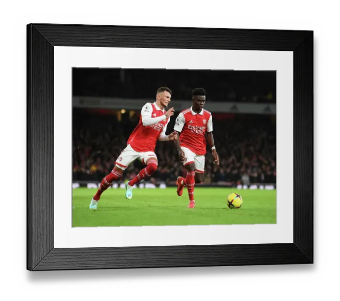 Framed Print : Arsenal's White and Saka in Action: A Premier League Battle - Arsenal vs Newcastle United, 2022-23 Framed Print : Arsenal's White and Saka in Action: A Premier League Battle - Arsenal vs Newcastle United, 2022-23
