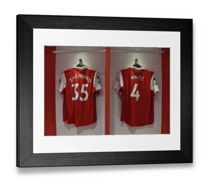 Framed Print : Arsenal Changing Room: Zinchenko and White Gear Up for Arsenal v Newcastle United (2022-23)