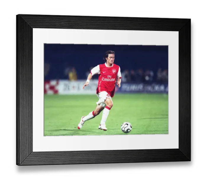 Framed Print : Tomas Rosicky's Unforgettable Night: Arsenal's 3-0 Thrashing of Dinamo Zagreb in the UEFA Champions League Qualifiers (August 2006)