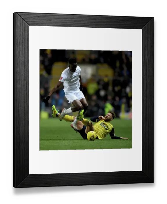 Framed Print : Arsenal's Albert Sambi Lokonga Faces Off Against Oxford's Matty Taylor in FA Cup Clash Framed Print : Arsenal's Albert Sambi Lokonga Faces Off Against Oxford's Matty Taylor in FA Cup Clash