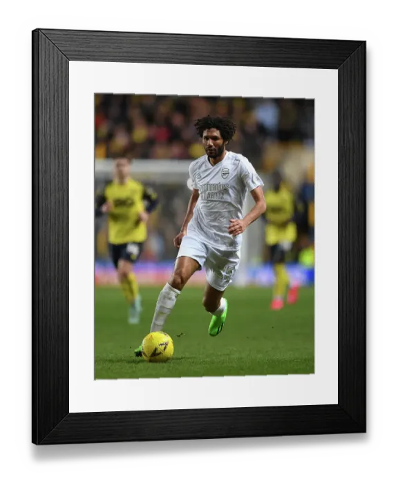 Framed Print : Arsenal's Mohamed Elneny in Action against Oxford United in FA Cup Third Round