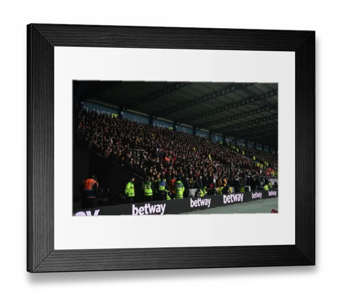 Framed Print : Arsenal Fans in Full Swing: FA Cup Third Round Clash vs. Oxford United Framed Print : Arsenal Fans in Full Swing: FA Cup Third Round Clash vs. Oxford United