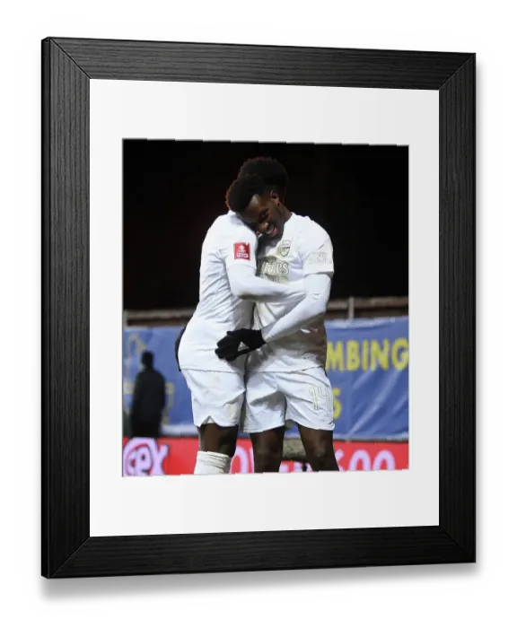 Framed Print : Arsenal's Nketiah and Saka Celebrate FA Cup Double Strike Against Oxford United Framed Print : Arsenal's Nketiah and Saka Celebrate FA Cup Double Strike Against Oxford United