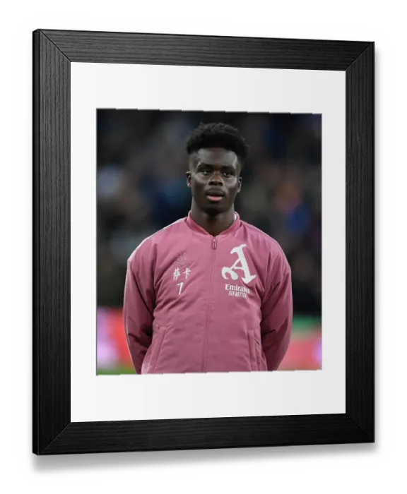 Framed Print : Bukayo Saka Gears Up: Tottenham vs. Arsenal, Premier League 2022-23
