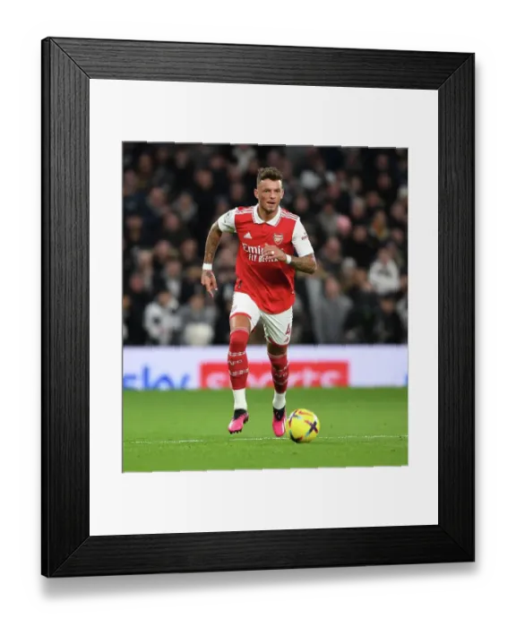Framed Print : Arsenal's Ben White Faces Off Against Tottenham Hotspur in Intense Premier League Showdown