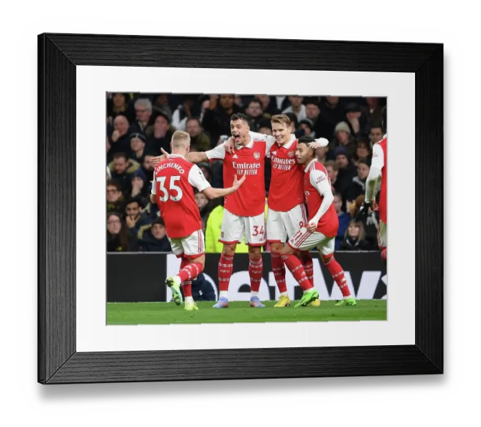 Framed Print : Martin Odegaard and Arsenal Team Celebrate Goals Against Tottenham Hotspur in Premier League Match, London 2023