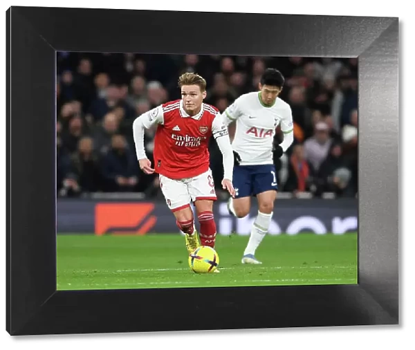Martin Odegaard in Action: Tottenham vs. Arsenal Premier League Clash (2022-23)