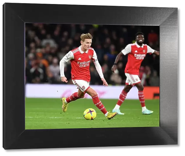 Martin Odegaard in Action: Arsenal vs. Tottenham Premier League Clash, 2022-23