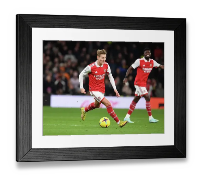 Framed Print : Martin Odegaard in Action: Arsenal vs. Tottenham Premier League Clash, 2022-23 Framed Print : Martin Odegaard in Action: Arsenal vs. Tottenham Premier League Clash, 2022-23