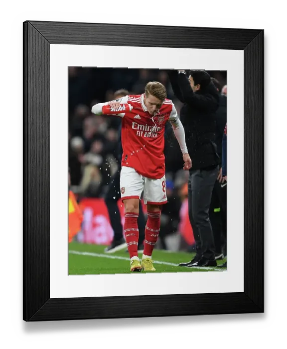 Framed Print : Martin Odegaard in Action: Tottenham vs Arsenal, Premier League 2022-23 Framed Print : Martin Odegaard in Action: Tottenham vs Arsenal, Premier League 2022-23