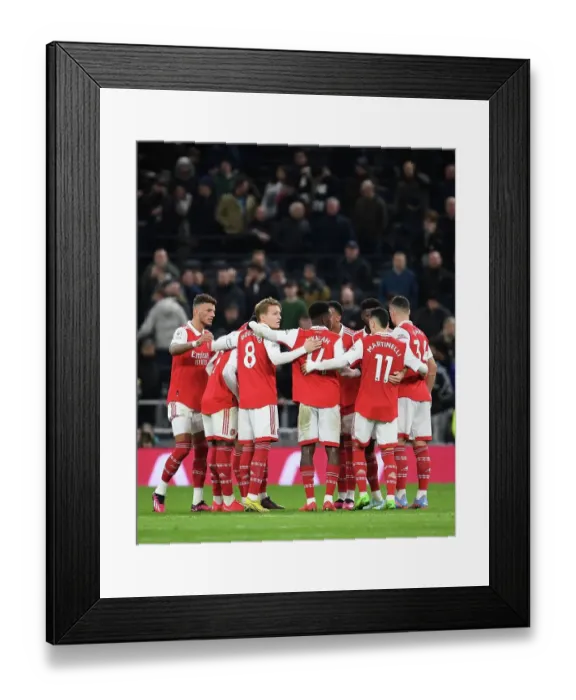 Framed Print : United in Determination: Arsenal's Half-Time Huddle vs. Tottenham Hotspur in the 2022-23 Premier League