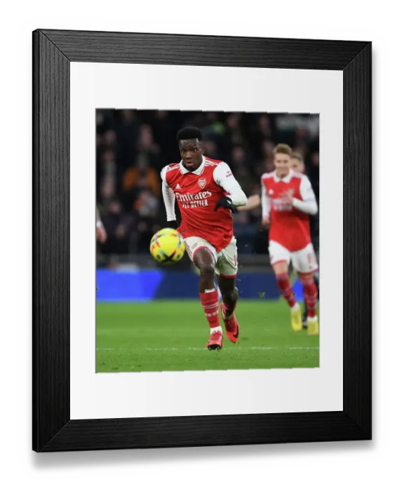 Framed Print : Arsenal's Eddie Nketiah Faces Off Against Tottenham Hotspur in Premier League Showdown (2022-23)