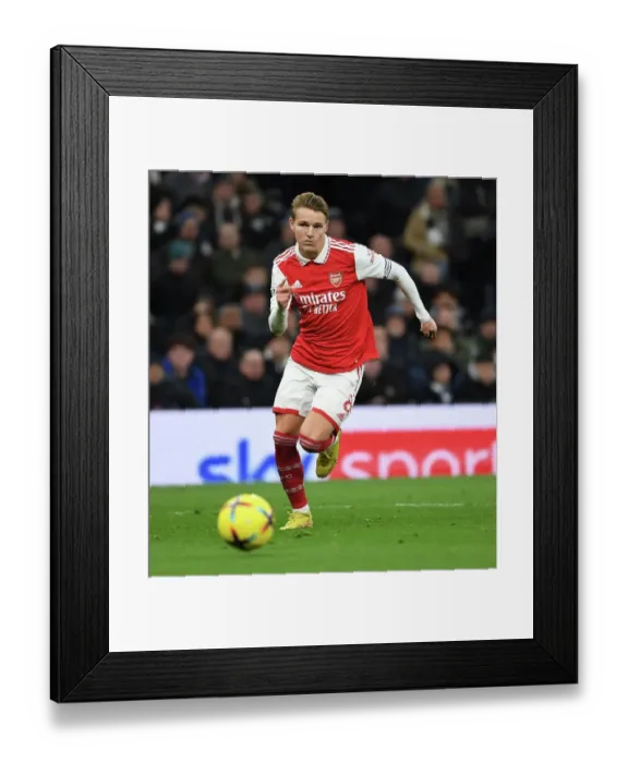 Framed Print : Martin Odegaard in Action: Arsenal vs. Tottenham Premier League Clash (2022-23)