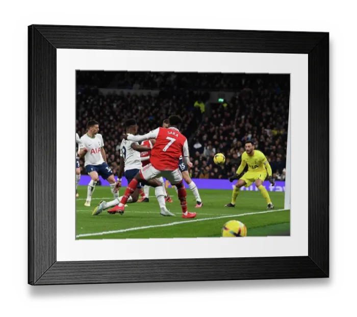 Framed Print : Bukayo Saka Scores the Thriller: Arsenal Triumphs Over Tottenham in Epic 2022-23 Premier League Clash