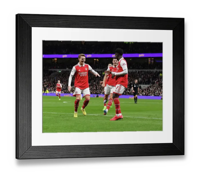 Framed Print : Triumphant Trio: Saka, Odegaard, Xhaka - Arsenal's First Goals of 2023 in Derby Win over Tottenham