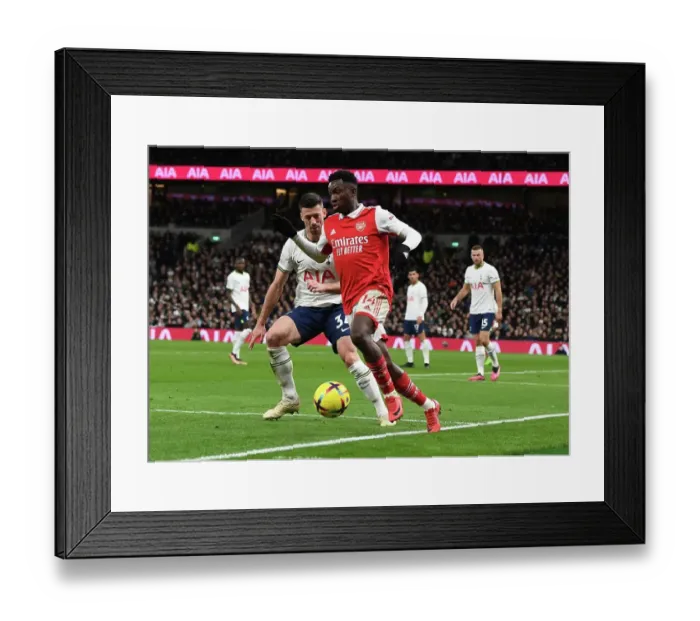 Framed Print : Arsenal's Eddie Nketiah Goes Head-to-Head with Tottenham Hotspur in Premier League Showdown (2022-23)