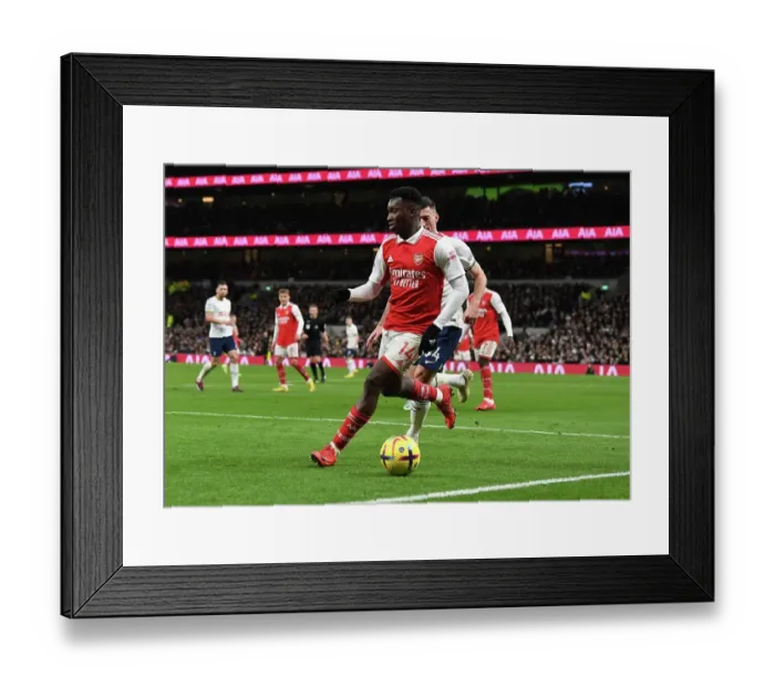 Framed Print : Arsenal's Eddie Nketiah Faces Off Against Tottenham Hotspur in Premier League Clash (2022-23)