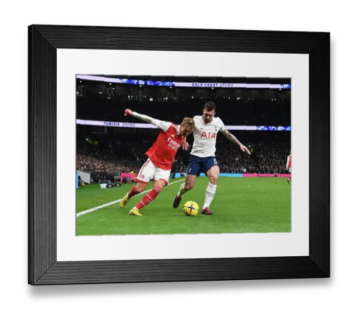 Framed Print : Clash of London Rivals: Odegaard vs. Hojbjerg in the Premier League Showdown - Tottenham vs. Arsenal