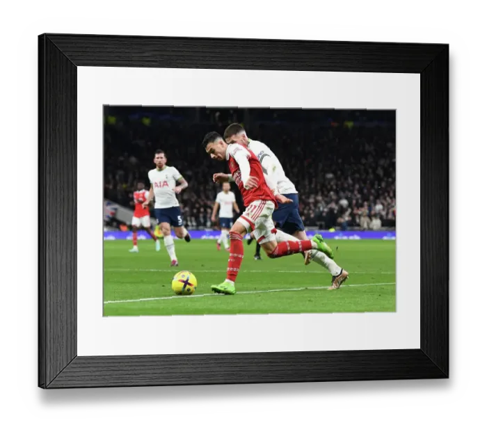 Framed Print : Gabriel Martinelli vs Matt Docherty: Battle in the Premier League - Tottenham Hotspur vs Arsenal FC (2022-23)