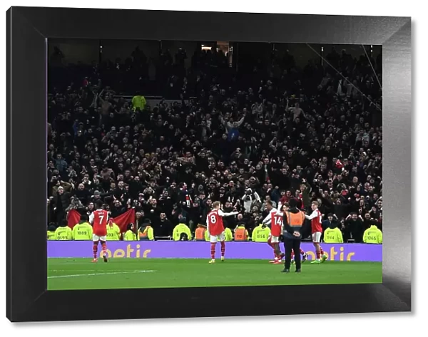 Arsenal Celebrate Hard-Fought Victory over Tottenham in London's Premier League Clash (2022-23)