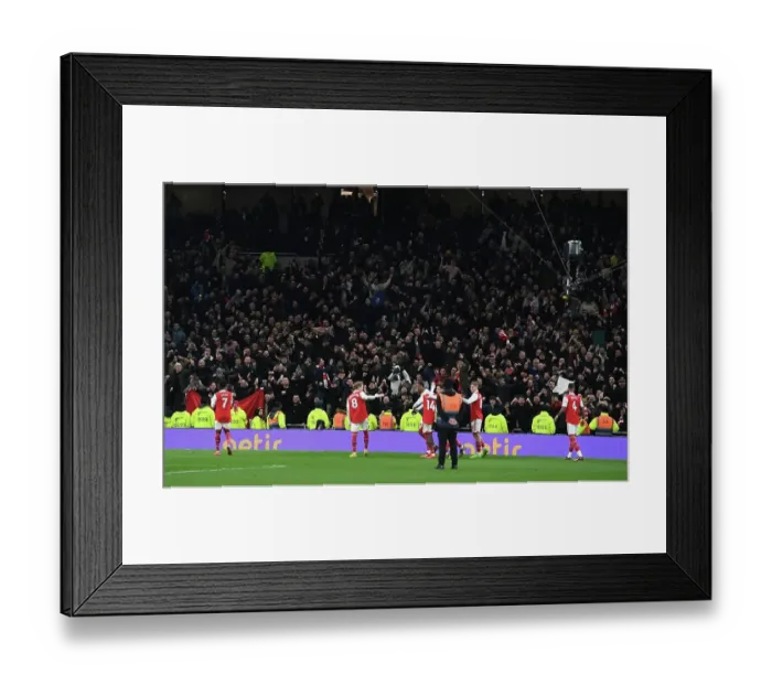Framed Print : Arsenal Celebrate Hard-Fought Victory over Tottenham in London's Premier League Clash (2022-23)