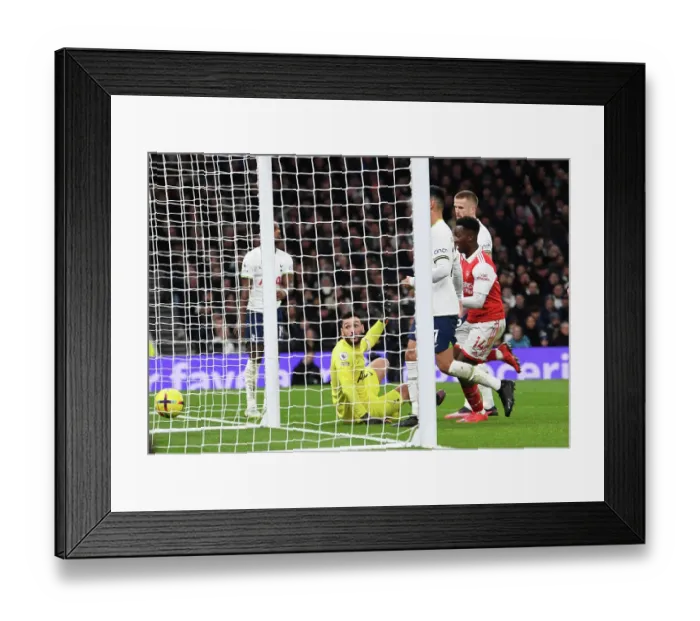 Framed Print : Arsenal Takes the Lead: Hugo Lloris Watches as Arsenal Scores First Goal Against Tottenham in Premier League Clash (January 2023)