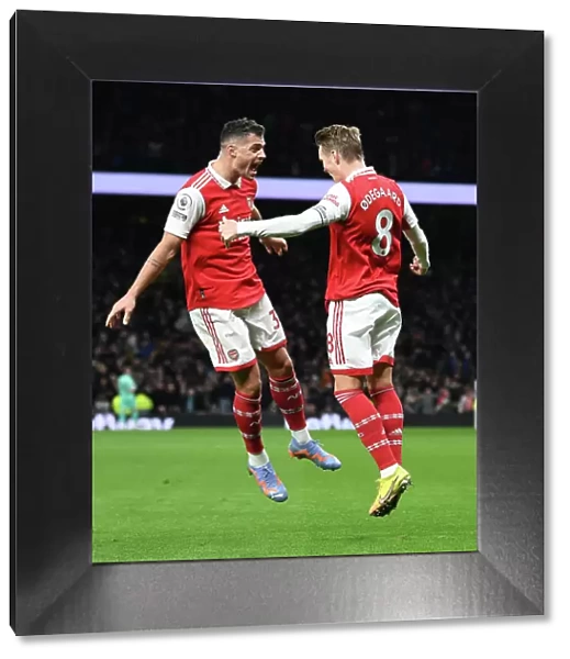 Martin Odegaard and Granit Xhaka Celebrate Arsenal's Winning Goal Against Tottenham Hotspur (2022-23)