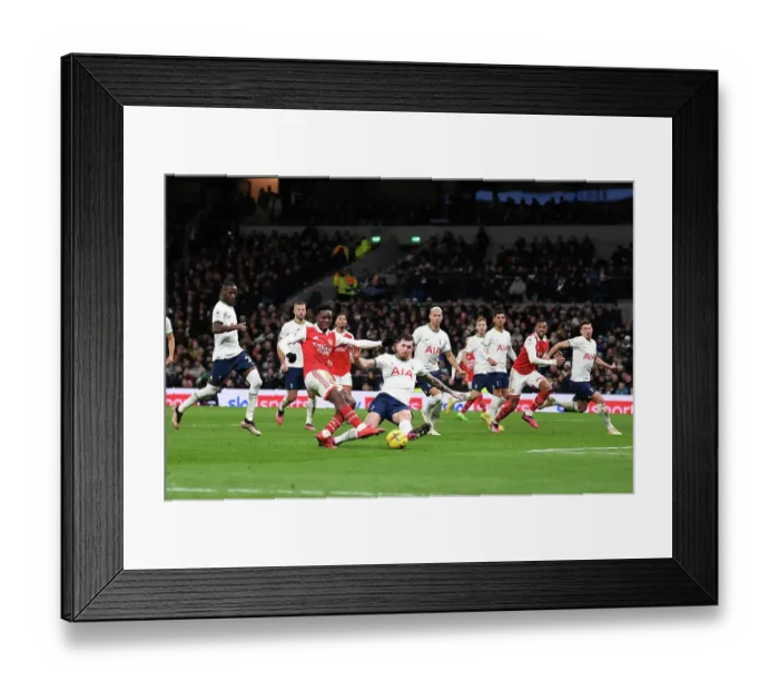 Framed Print : Arsenal's Eddie Nketiah Faces Off Against Tottenham's Clement Lenglet in Intense Premier League Showdown