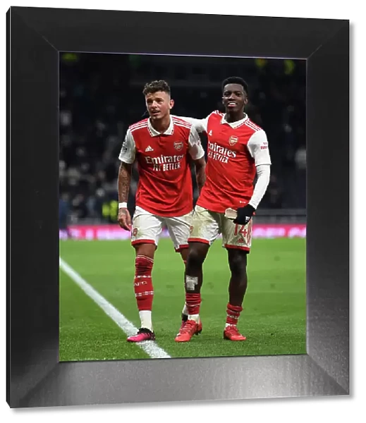 Arsenal's Ben White and Eddie Nketiah Celebrate Victory Over Tottenham Hotspur in 2022-23 Premier League Clash