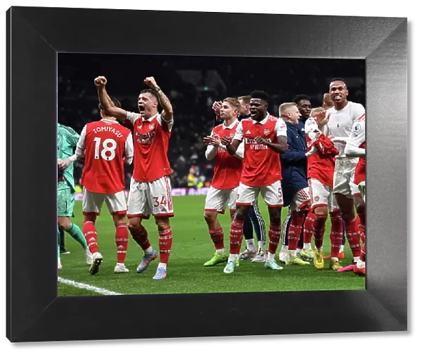 Arsenal's Xhaka and Partey: Triumphant Victory Celebration vs. Tottenham in Premier League