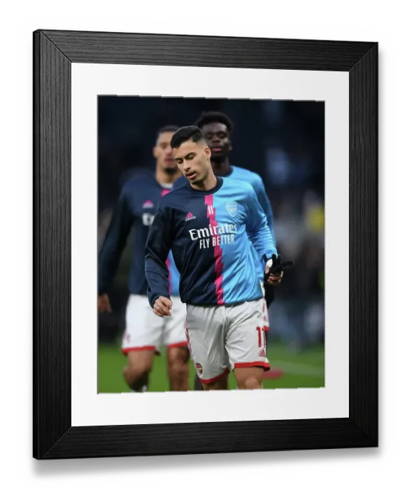 Framed Print : Gabriel Martinelli's Focus: Readying for Arsenal-Tottenham Showdown in Premier League 2022-23