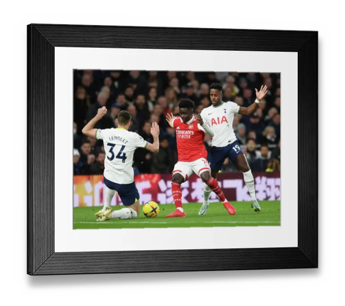 Framed Print : Saka vs Sessegnon-Lenglet: Battle at Tottenham Hotspur Stadium - Arsenal vs Tottenham, Premier League 2022-23