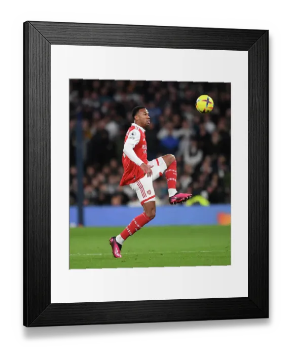Framed Print : Gabriel Magalhaes in Action: Arsenal vs. Tottenham Premier League Clash 2022-23