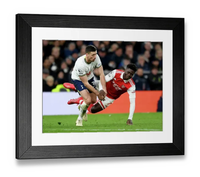 Framed Print : Bukayo Saka Fouled by Lenglet: Tottenham vs. Arsenal, Premier League 2022-23 Framed Print : Bukayo Saka Fouled by Lenglet: Tottenham vs. Arsenal, Premier League 2022-23