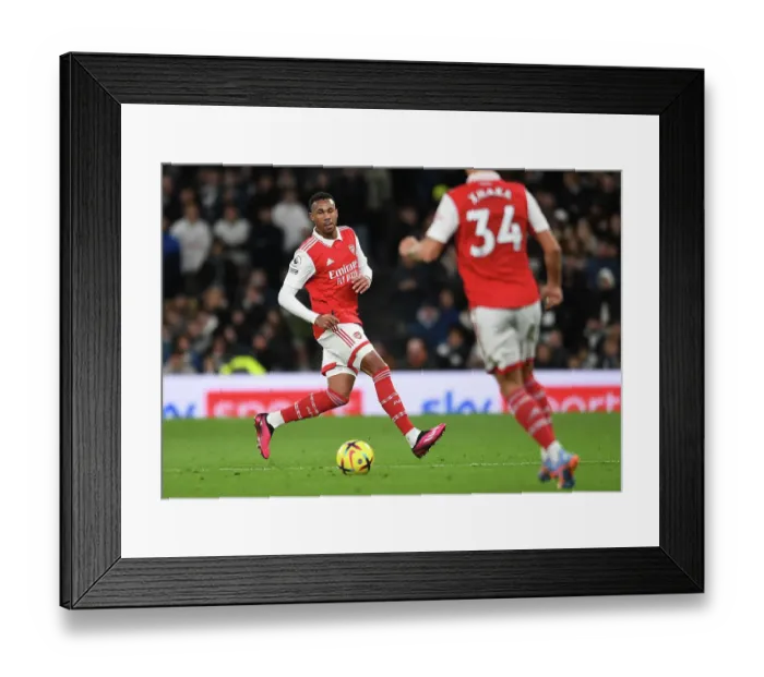 Framed Print : Gabriel Magalhaes in Action: Arsenal vs. Tottenham's Intense Battle, Premier League 2022-23