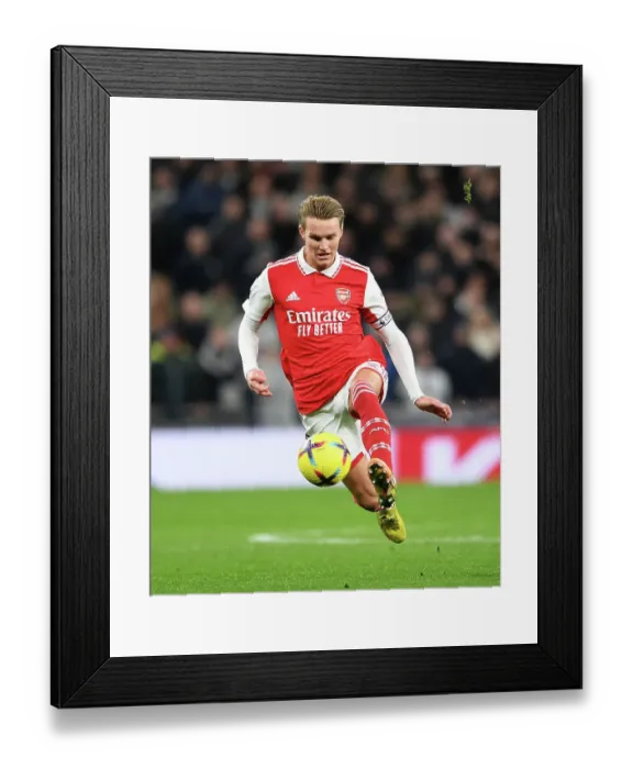 Framed Print : Martin Odegaard in Action: Arsenal vs. Tottenham, Premier League 2022-23 Framed Print : Martin Odegaard in Action: Arsenal vs. Tottenham, Premier League 2022-23