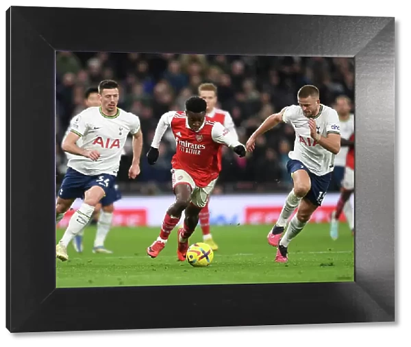Arsenal's Nketiah Clashes with Tottenham's Lenglet and Dier in Premier League Showdown