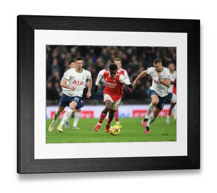 Framed Print : Arsenal's Nketiah Clashes with Tottenham's Lenglet and Dier in Premier League Showdown