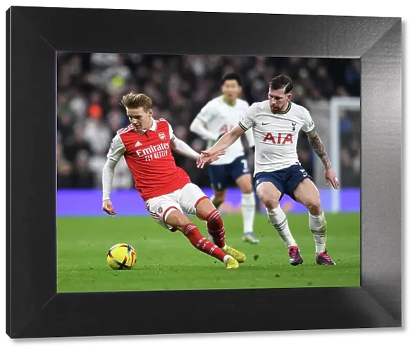 Clash in the Capital: Odegaard vs. Hojbjerg - A Battle of Wits in the Premier League 2022-23: Tottenham vs. Arsenal