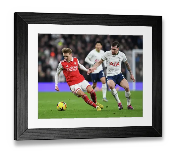 Framed Print : Clash in the Capital: Odegaard vs. Hojbjerg - A Battle of Wits in the Premier League 2022-23: Tottenham vs. Arsenal Framed Print : Clash in the Capital: Odegaard vs. Hojbjerg - A Battle of Wits in the Premier League 2022-23: Tottenham vs. Arsenal