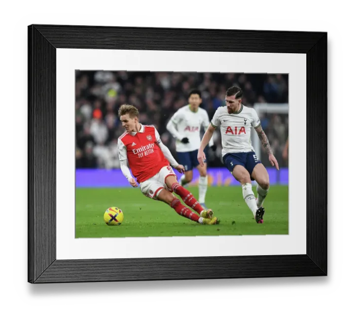 Framed Print : Clash in the Capital: Odegaard vs. Hojbjerg - A Premier League Rivalry Unfolds (Arsenal vs. Tottenham 2022-23)