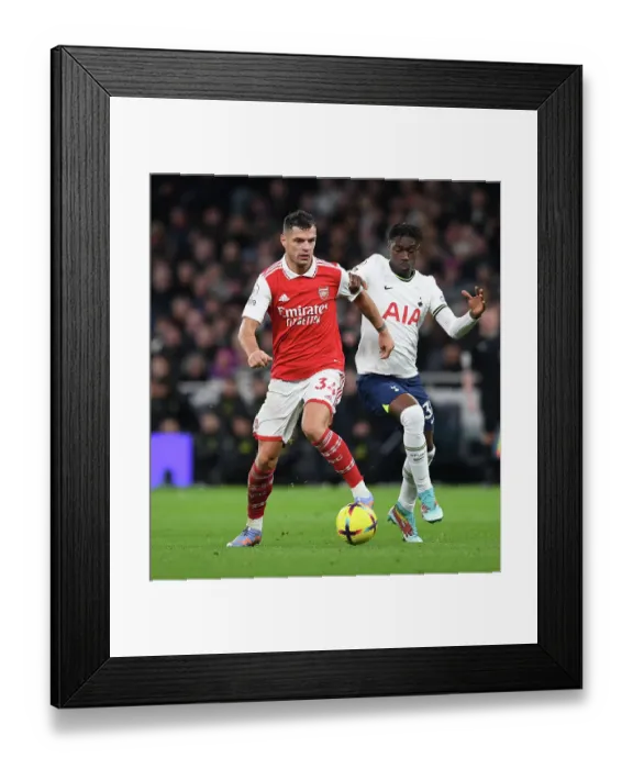 Framed Print : Xhaka vs Bissouma: Battle in the Heart of Midfield - Tottenham vs Arsenal, Premier League 2022-23 Framed Print : Xhaka vs Bissouma: Battle in the Heart of Midfield - Tottenham vs Arsenal, Premier League 2022-23